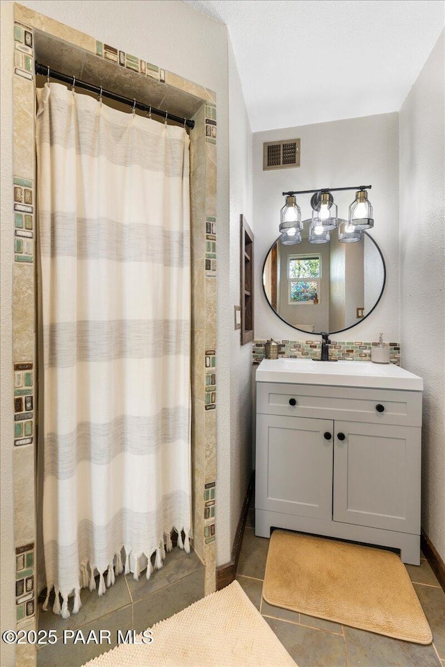 714 Mingus Ave, Prescott, AZ 86301 - full bathroom with vanity, tile patterned flooring, and a shower with curtain
