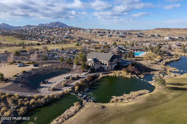 bird's eye view featuring a water and mountain view