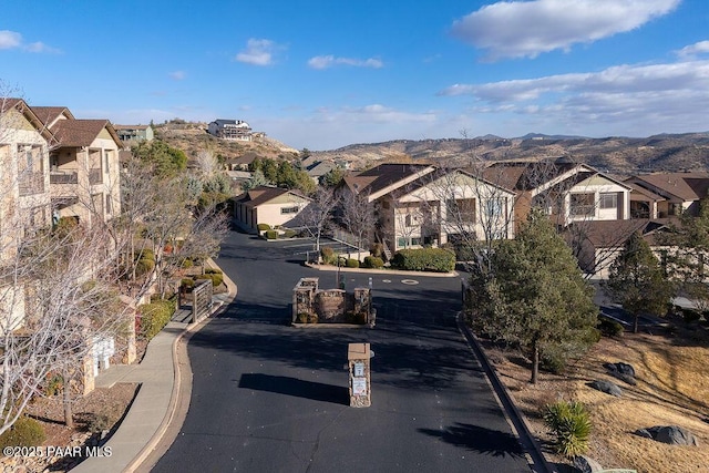 view of front of home featuring a mountain view