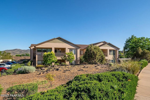 view of front of home with a mountain view