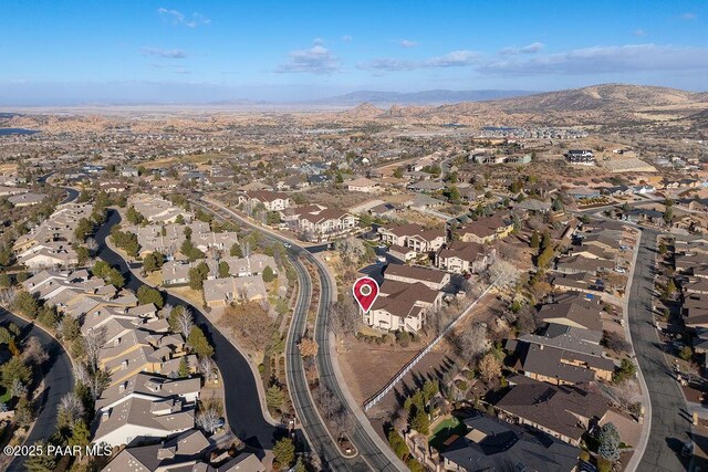 drone / aerial view featuring a mountain view