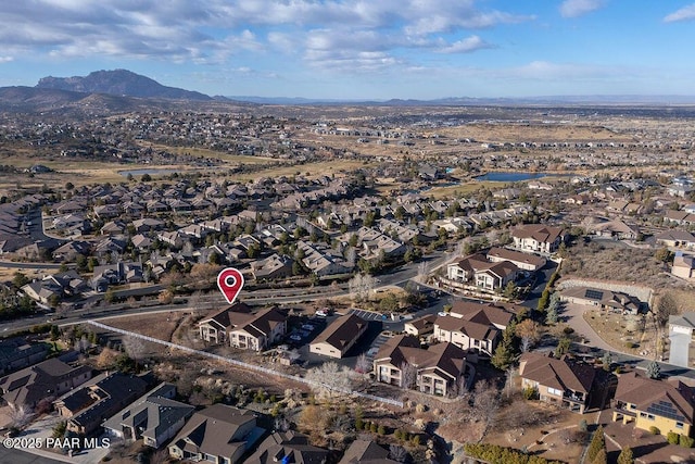 drone / aerial view featuring a mountain view