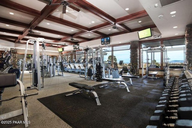 workout area featuring carpet, ceiling fan, and coffered ceiling