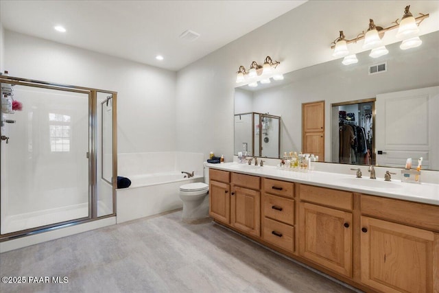 1716 Alpine Meadows Ln Unit 602, Prescott, AZ 86303 - bathroom with a shower stall, double vanity, a garden tub, wood finished floors, and a spacious closet