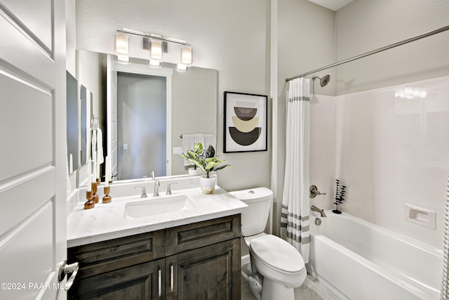 full bathroom with vanity, toilet, and shower / bath combo