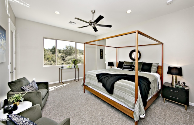 bedroom with ceiling fan and carpet floors