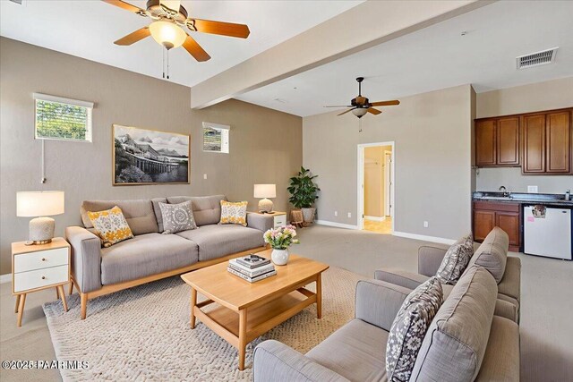 1183 Northridge Dr, Prescott, AZ 86301 - living room with ceiling fan, light colored carpet, and beamed ceiling