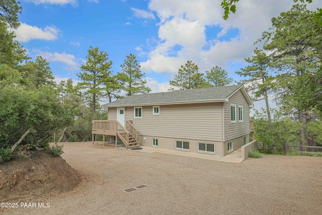 1251 Navajo Way, Prescott, AZ 86305 - rear view of property with stairs, a deck, and a shingled roof