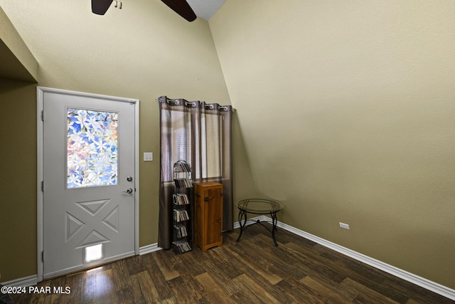 entrance foyer featuring ceiling fan, dark hardwood / wood-style flooring, and vaulted ceiling