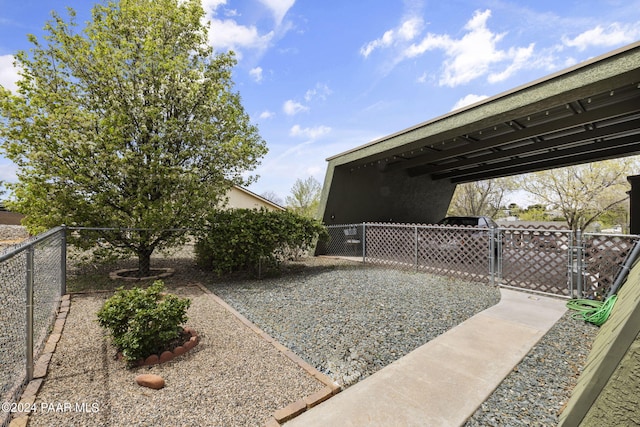 view of yard with a carport