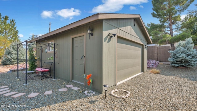 view of outbuilding featuring a garage