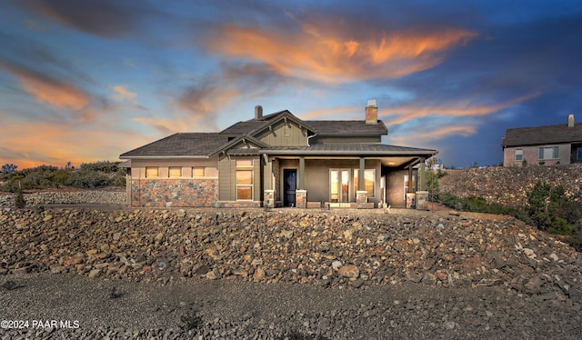 view of front of home with a patio