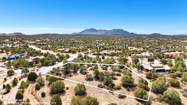 birds eye view of property featuring a residential view and a mountain view