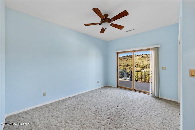 14420 Jagged Tooth Trl, Mayer, AZ 86333 - carpeted spare room with ceiling fan