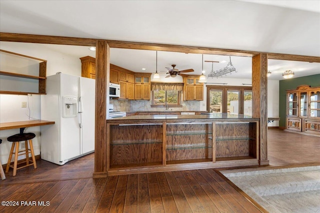 14420 Jagged Tooth Trl, Mayer, AZ 86333 - kitchen featuring ceiling fan, hanging light fixtures, dark hardwood / wood-style floors, backsplash, and white appliances