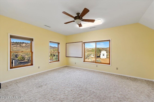 14420 Jagged Tooth Trl, Mayer, AZ 86333 - carpeted empty room with healthy amount of natural light and a ceiling fan
