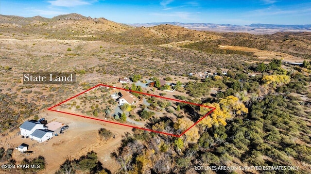 14420 Jagged Tooth Trl, Mayer, AZ 86333 - drone / aerial view with a mountain view
