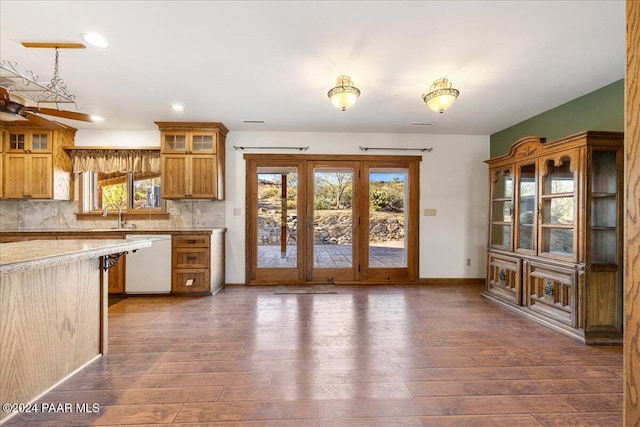 14420 Jagged Tooth Trl, Mayer, AZ 86333 - kitchen with a wealth of natural light, dishwasher, and dark wood-type flooring