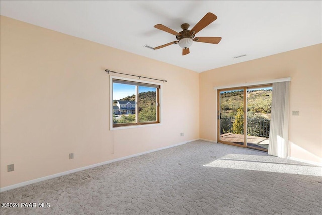 14420 Jagged Tooth Trl, Mayer, AZ 86333 - carpeted spare room featuring ceiling fan