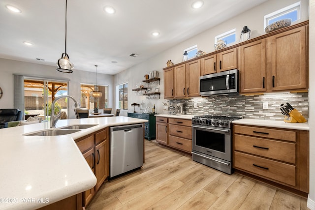 6135 Livingston Loop, Prescott Valley, AZ 86314 - kitchen featuring stainless steel appliances, open shelves, brown cabinets, decorative backsplash, and recessed lighting