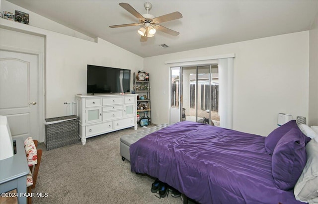 bedroom with ceiling fan, carpet floors, and vaulted ceiling