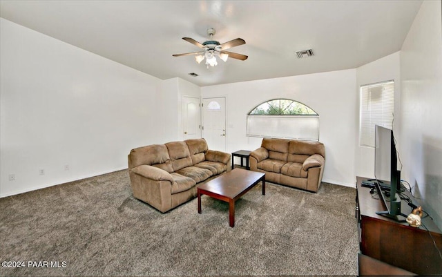 carpeted living room featuring ceiling fan