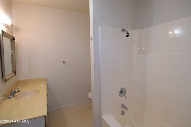 full bathroom with vanity, shower / bath combination, and toilet