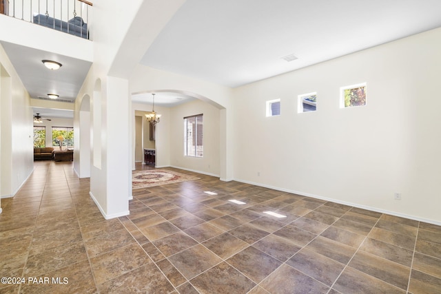 7590 E Traders Trl, Prescott Valley, AZ 86314 - interior space featuring ceiling fan with notable chandelier