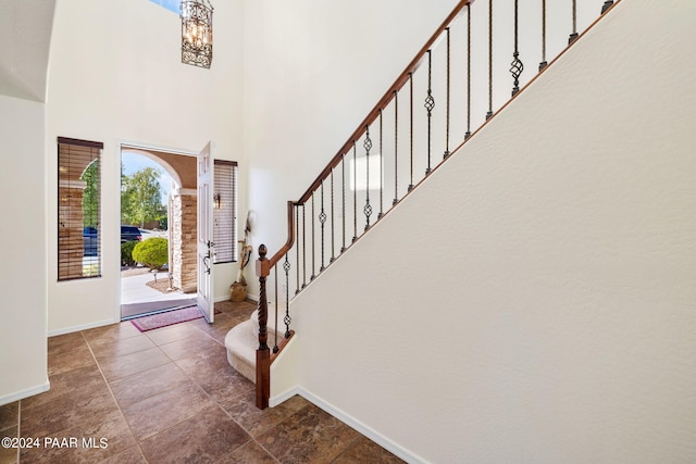 7590 E Traders Trl, Prescott Valley, AZ 86314 - entrance foyer featuring a towering ceiling and a notable chandelier