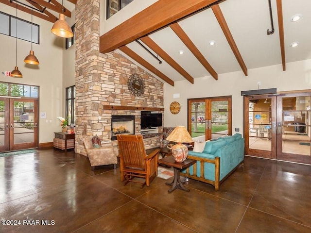 7590 E Traders Trl, Prescott Valley, AZ 86314 - living room with french doors, high vaulted ceiling, a healthy amount of sunlight, and beamed ceiling