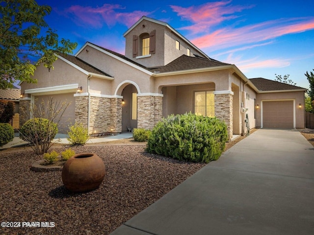 view of front of house with a garage