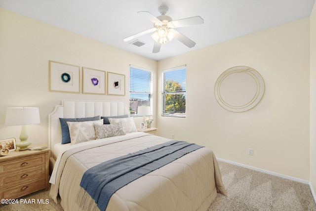 7590 E Traders Trl, Prescott Valley, AZ 86314 - bedroom featuring ceiling fan and light carpet