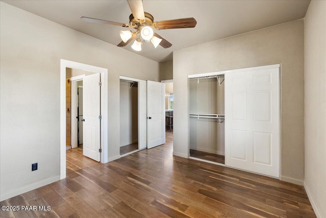 17940 E Native Dancer Ln, Dewey-Humboldt, AZ 86327 - unfurnished bedroom featuring dark wood finished floors and a ceiling fan