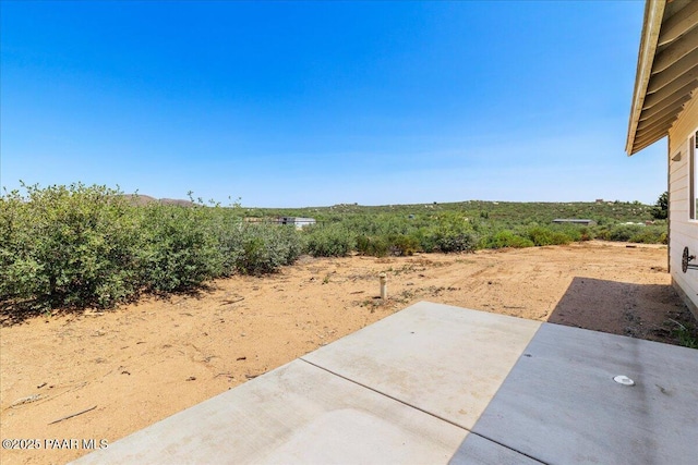 17940 E Native Dancer Ln, Dewey-Humboldt, AZ 86327 - view of yard featuring a patio and a rural view