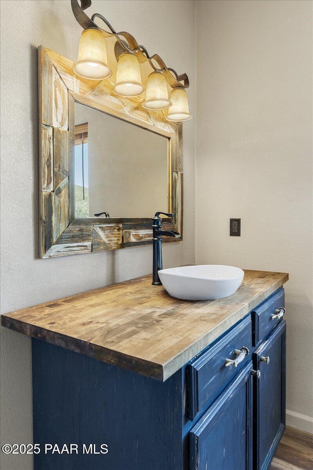 17940 E Native Dancer Ln, Dewey-Humboldt, AZ 86327 - bathroom featuring vanity and wood finished floors