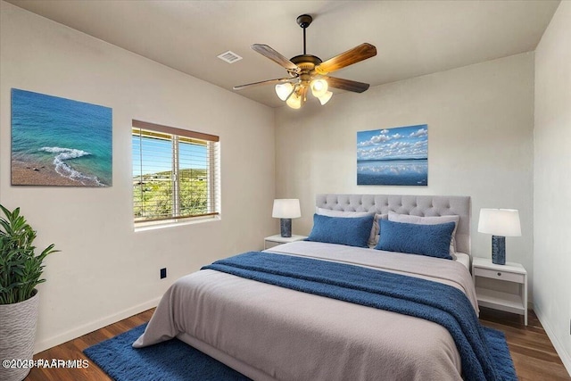 17940 E Native Dancer Ln, Dewey-Humboldt, AZ 86327 - bedroom featuring wood finished floors and a ceiling fan