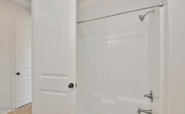 bathroom with shower / bath combination