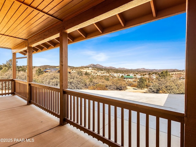 wooden terrace with a mountain view