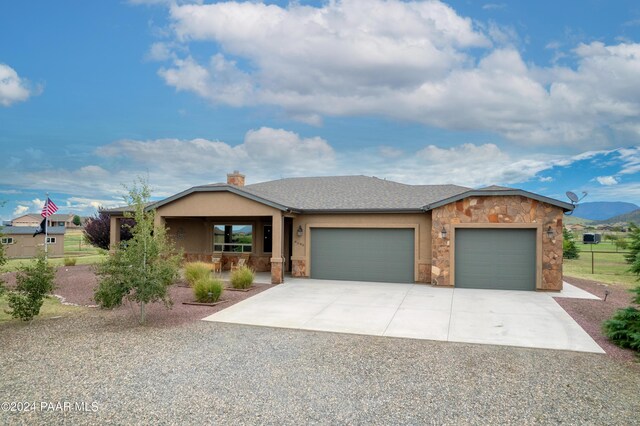 view of front of home with a garage