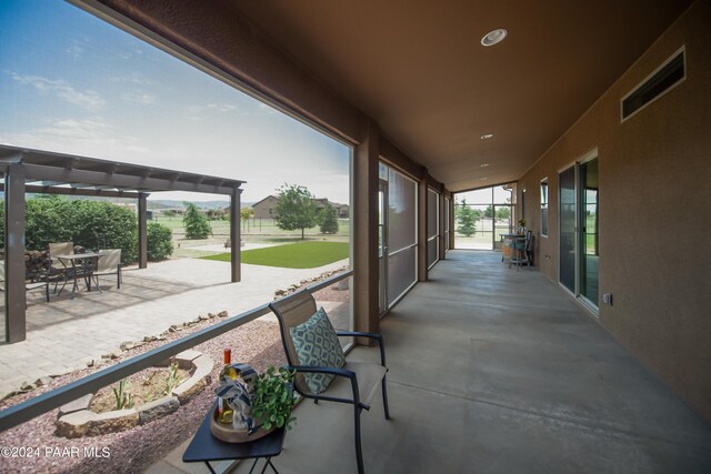 view of patio featuring a pergola