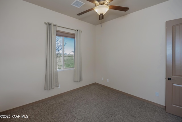 carpeted empty room with ceiling fan