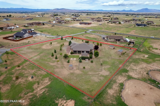 aerial view featuring a mountain view and a rural view