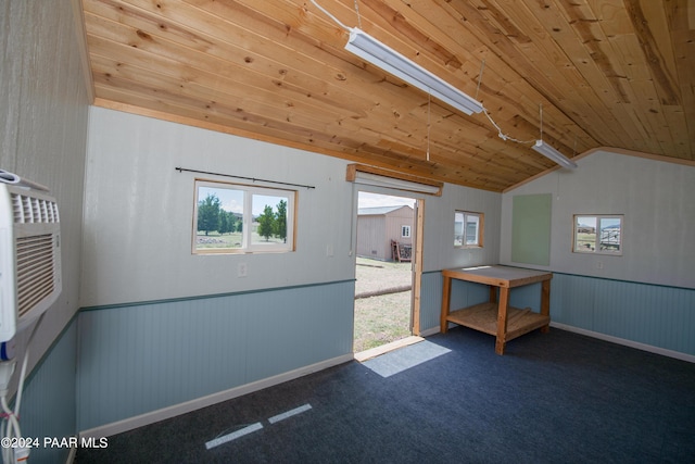 bonus room featuring wooden ceiling, vaulted ceiling, and dark carpet