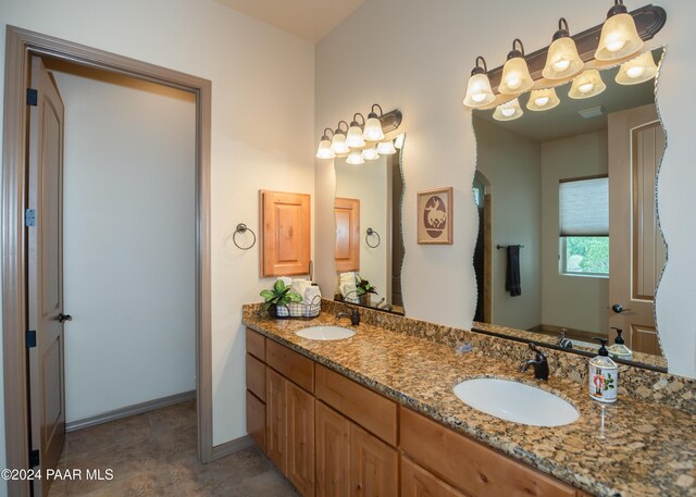 bathroom with tile patterned flooring and vanity