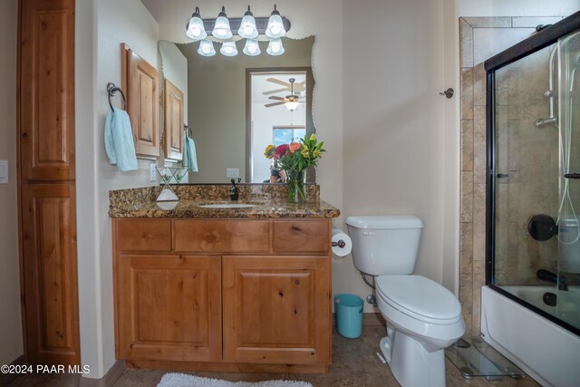 full bathroom featuring vanity, toilet, ceiling fan, and enclosed tub / shower combo