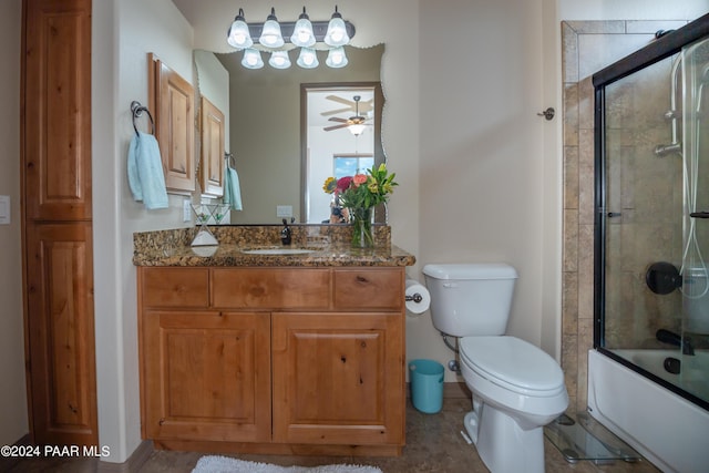 full bathroom with combined bath / shower with glass door, vanity, toilet, and ceiling fan