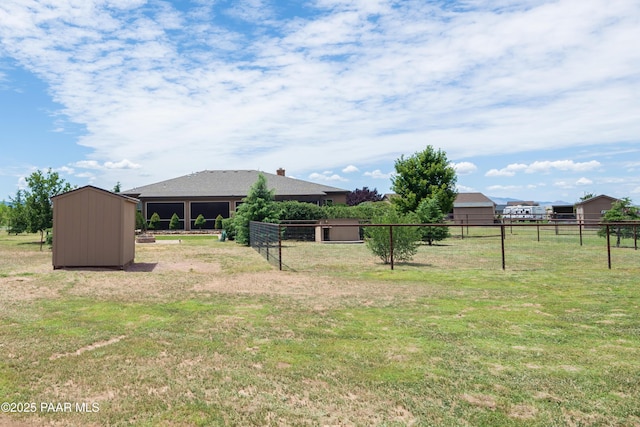 view of yard with a storage shed