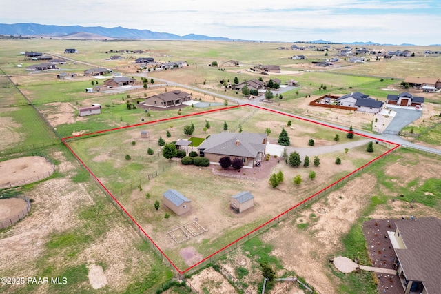 bird's eye view with a mountain view and a rural view