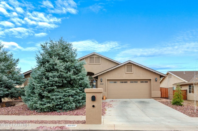 view of front of home with a garage