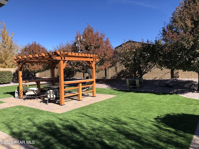 view of yard with a patio and a pergola